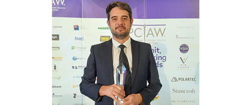 Florent Cottin receiving PCIAW award